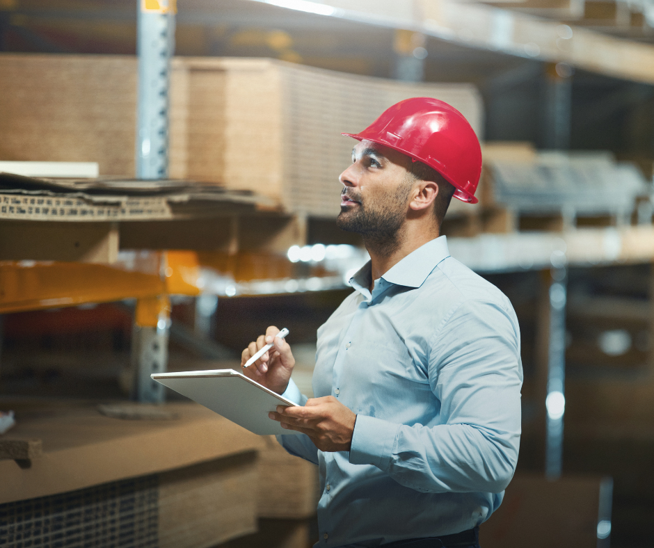 man performing pallet racking safety inspections